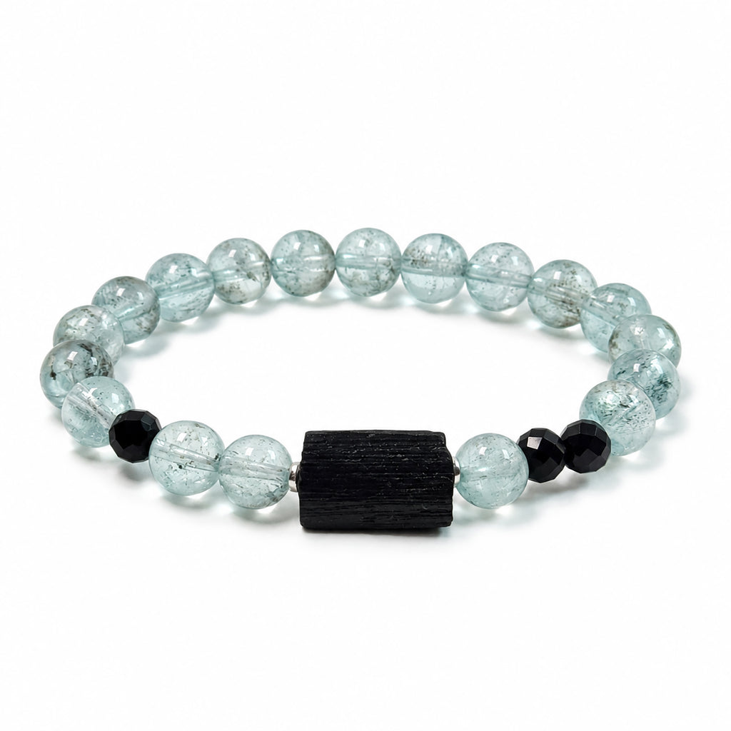 Side view of rare green-toned Aquamarine bracelet with raw Black Tourmaline and Black Spinel