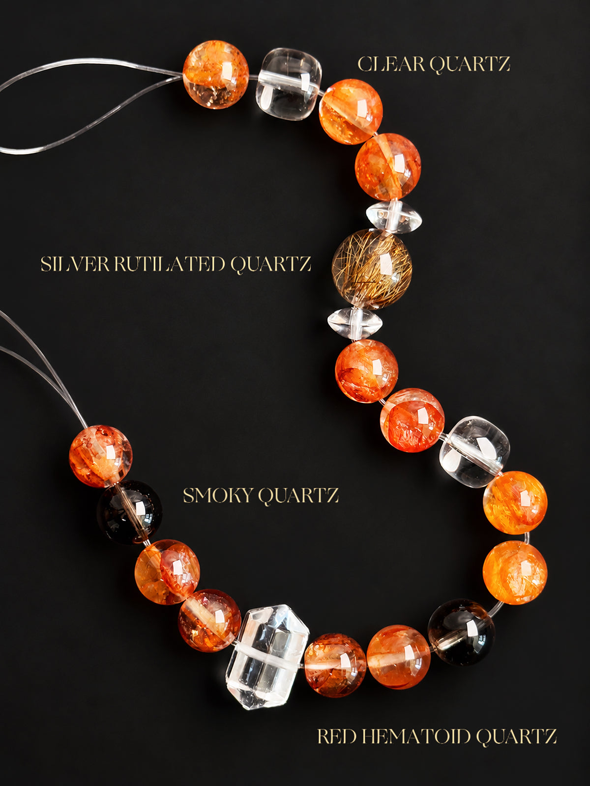 Natural Red Hematoid Quartz, Silver Rutilated Quartz, Smoky Quartz and Clear Quartz bracelet on a dark charcoal background, highlighting red flake-like inclusions, fine silver rutile needle