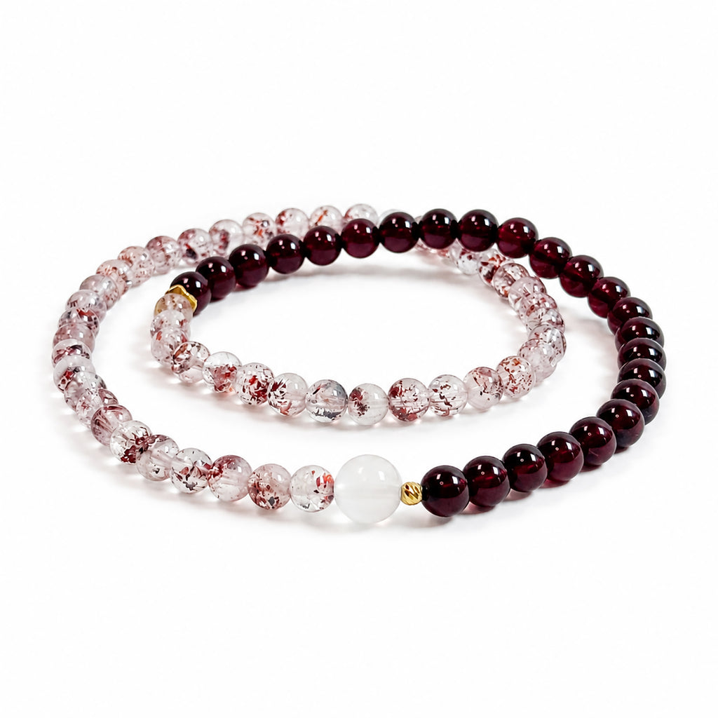 Side view of a Red Super Seven Quartz and Garnet double-wrap bracelet with Moonstone and gold-plated sterling silver accents on a white background.