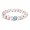 Rose quartz bracelet on clean white background for love and self-love
