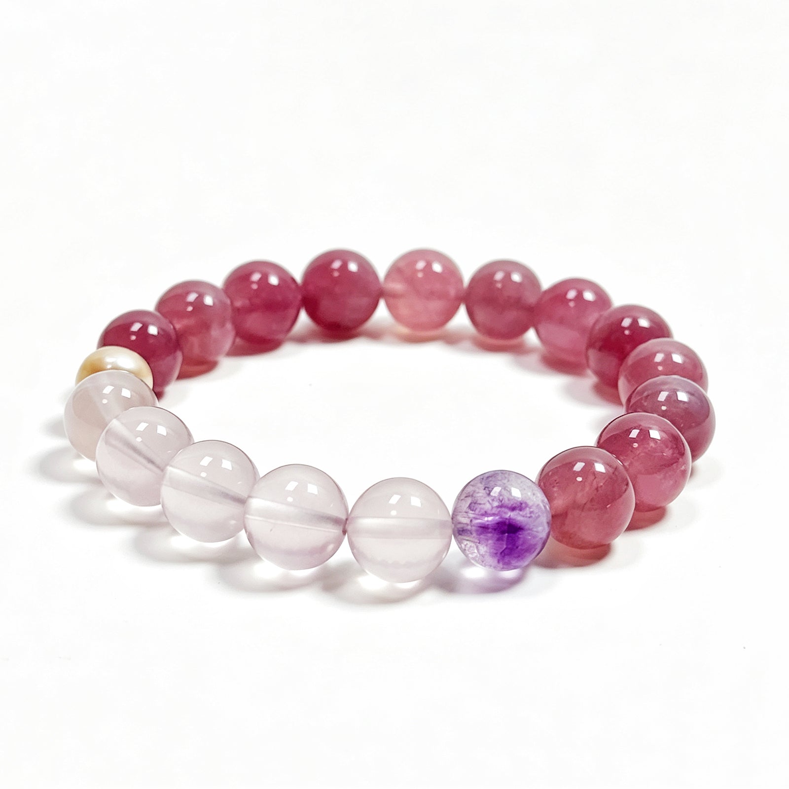 Rose quartz bracelet on clean white background for love and self-love