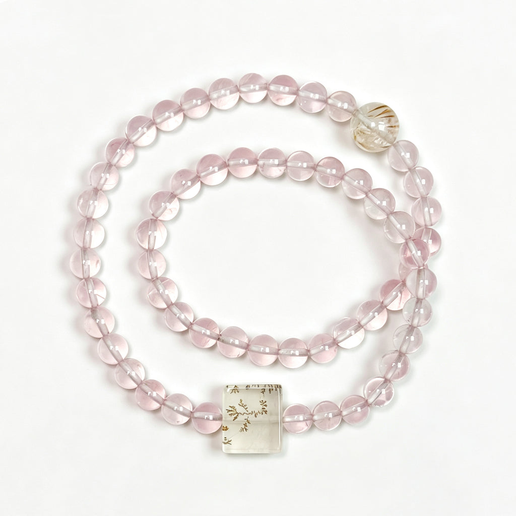 Top view of rose quartz crystal bracelet showing full bead arrangement for love and emotional connection