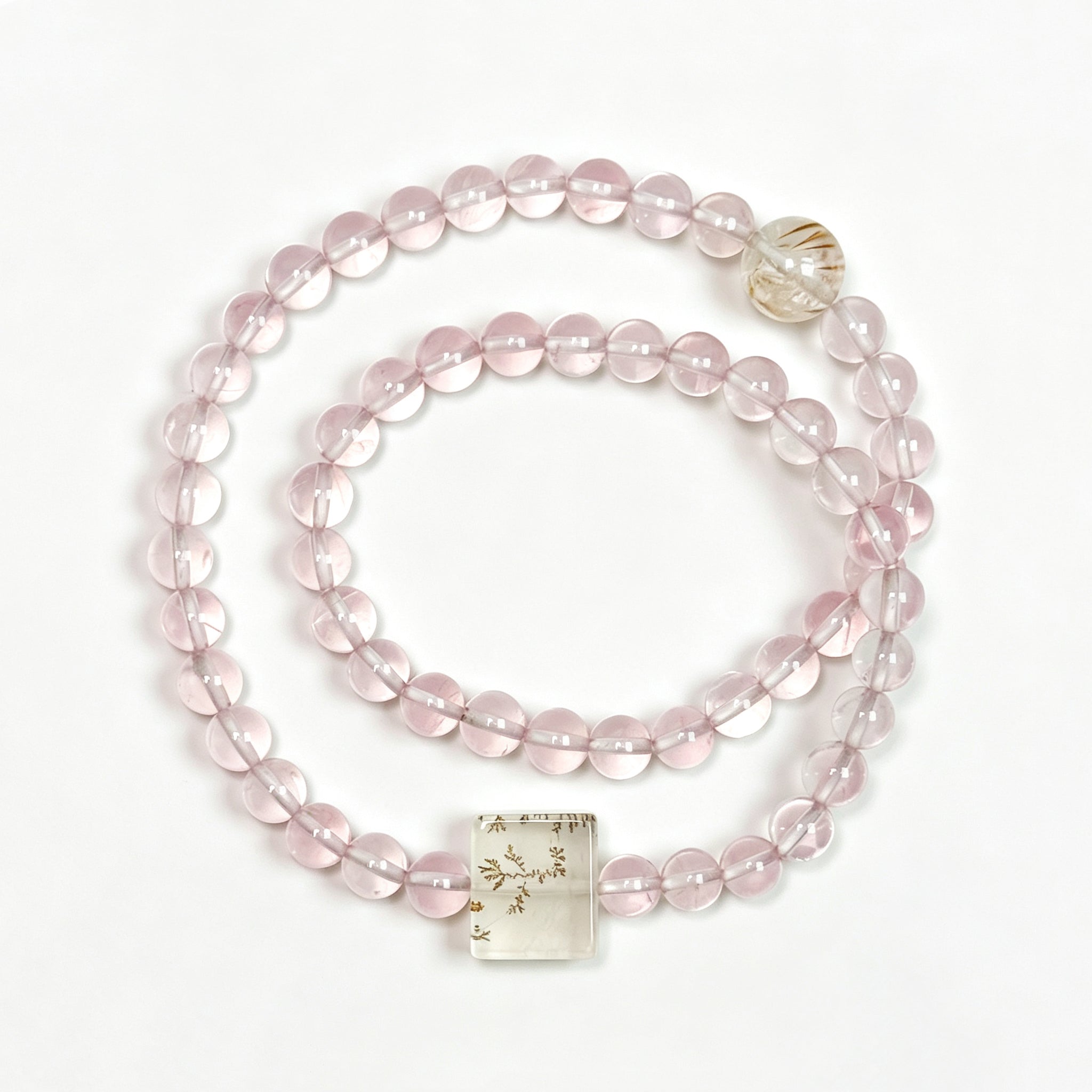 Top view of rose quartz crystal bracelet showing full bead arrangement for love and emotional connection