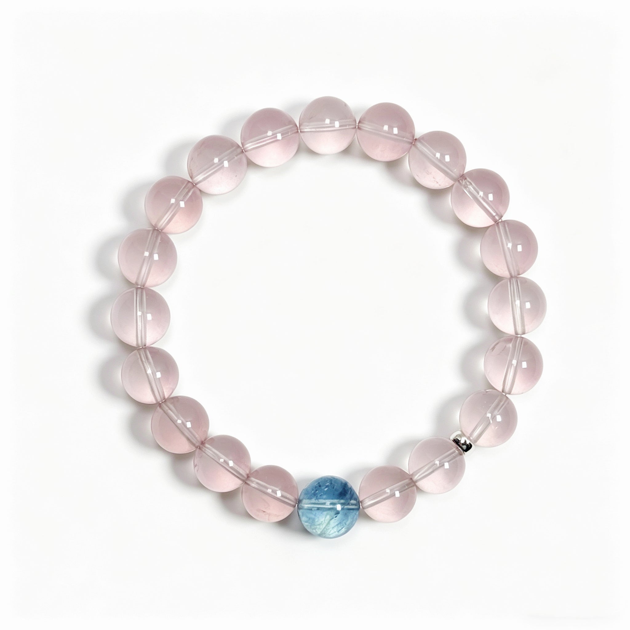 Top view of rose quartz crystal bracelet showing full bead arrangement for love and emotional connection
