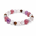 Rose quartz and Super Seven bracelet on clean white background for grounded love and emotional clarity

