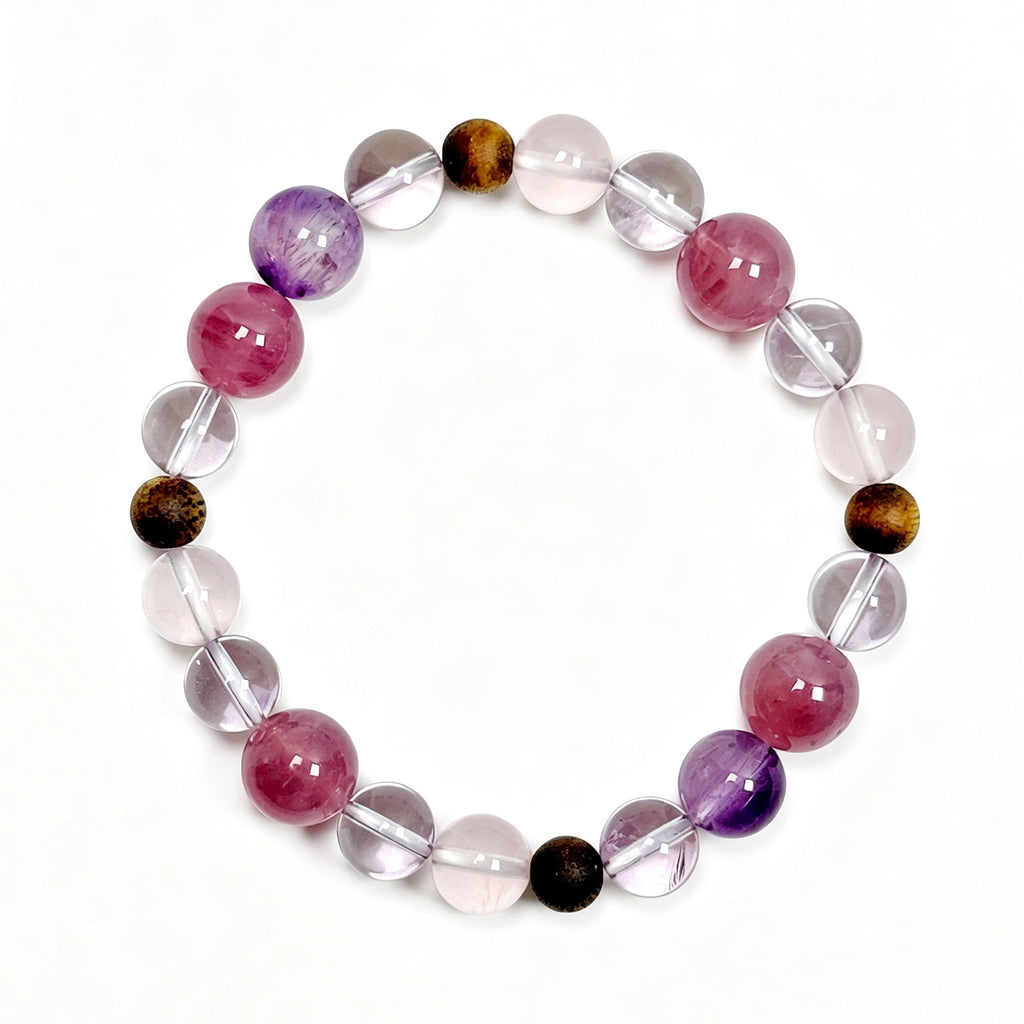 Top view of rose quartz and Super Seven crystal bracelet showing mixed bead 