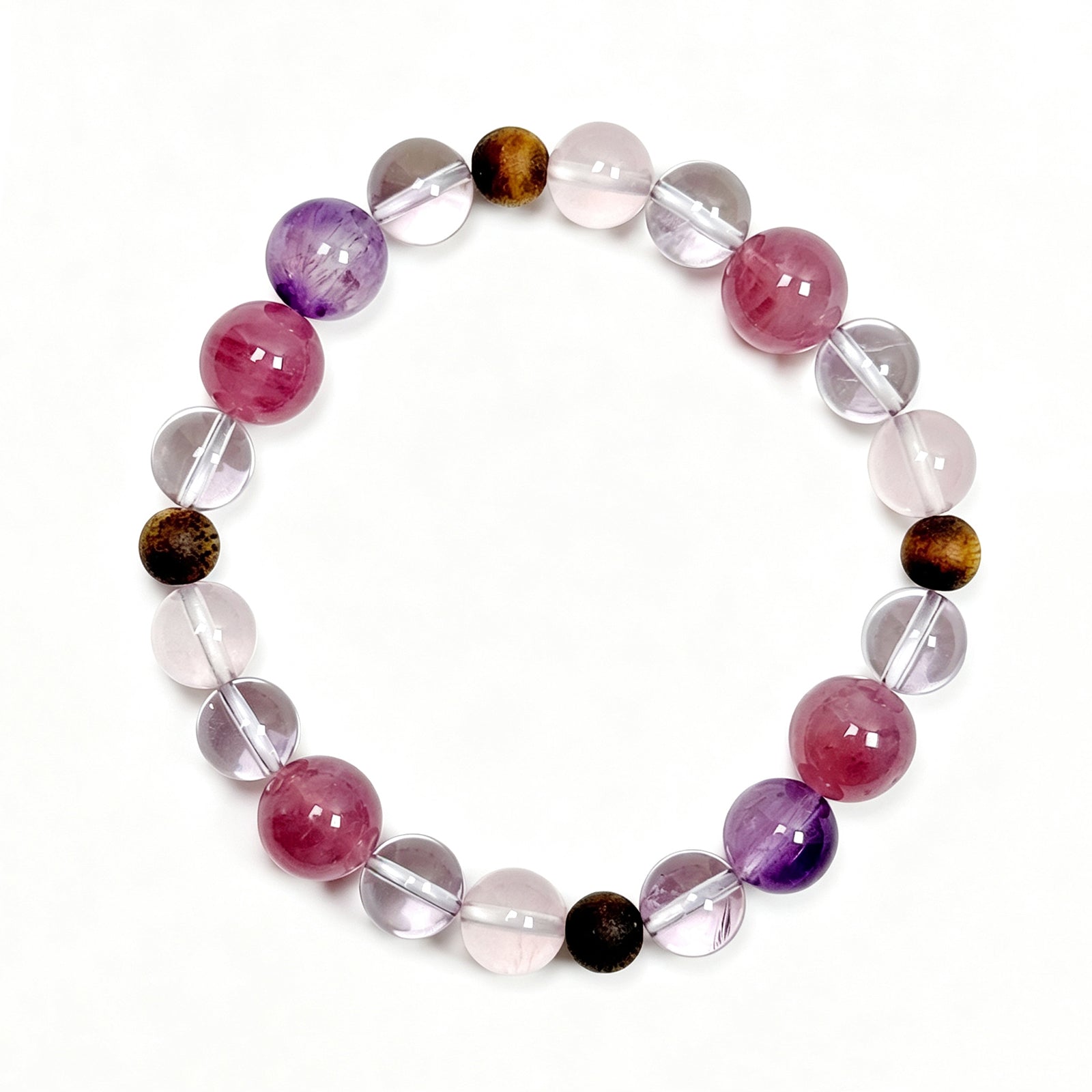 Top view of rose quartz and Super Seven crystal bracelet showing mixed bead 
