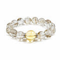 Silver Rutilated Quartz manifestation bracelet on clean white background