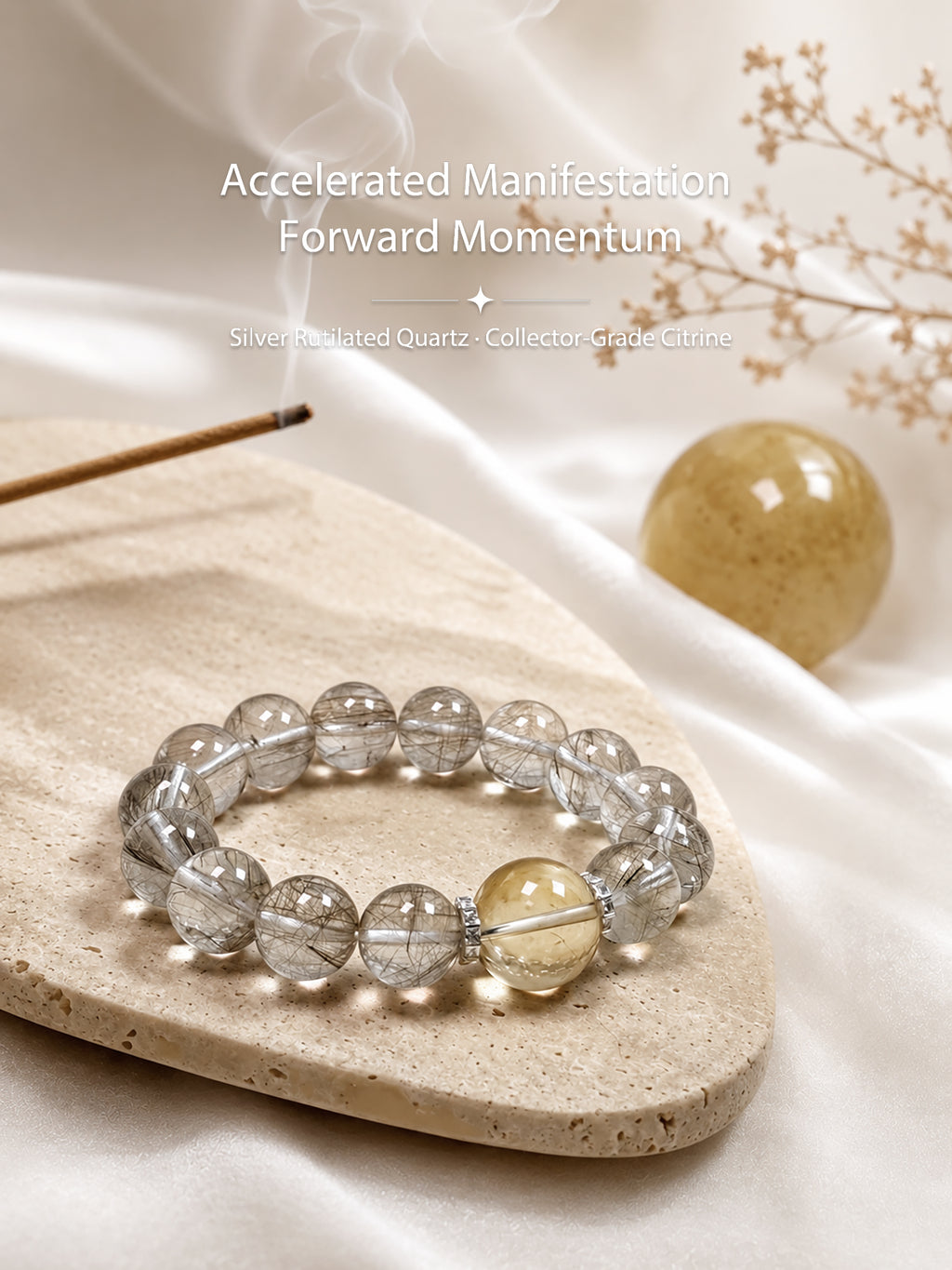 Silver Rutilated Quartz manifestation bracelet styled on meditation altar with calming spiritual objects