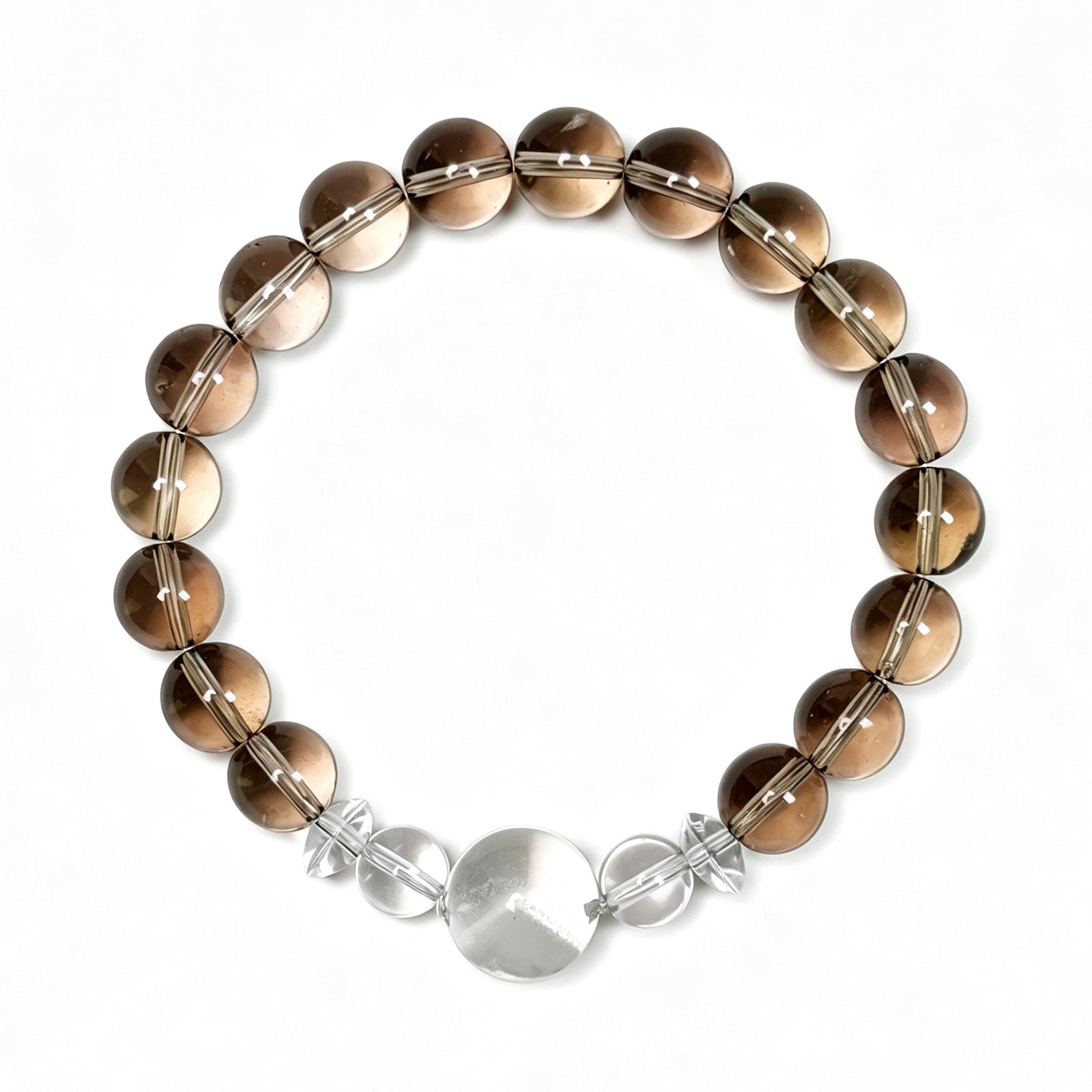Top view of smoky quartz and white phantom quartz bracelet showing full bead arrangement for grounding and emotional balance