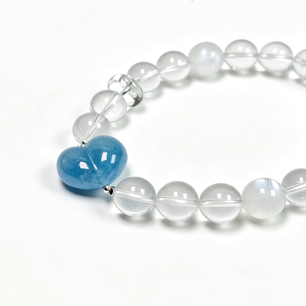 Close-up detail of Snow Strawberry Quartz bracelet showing natural texture and soft shimmer