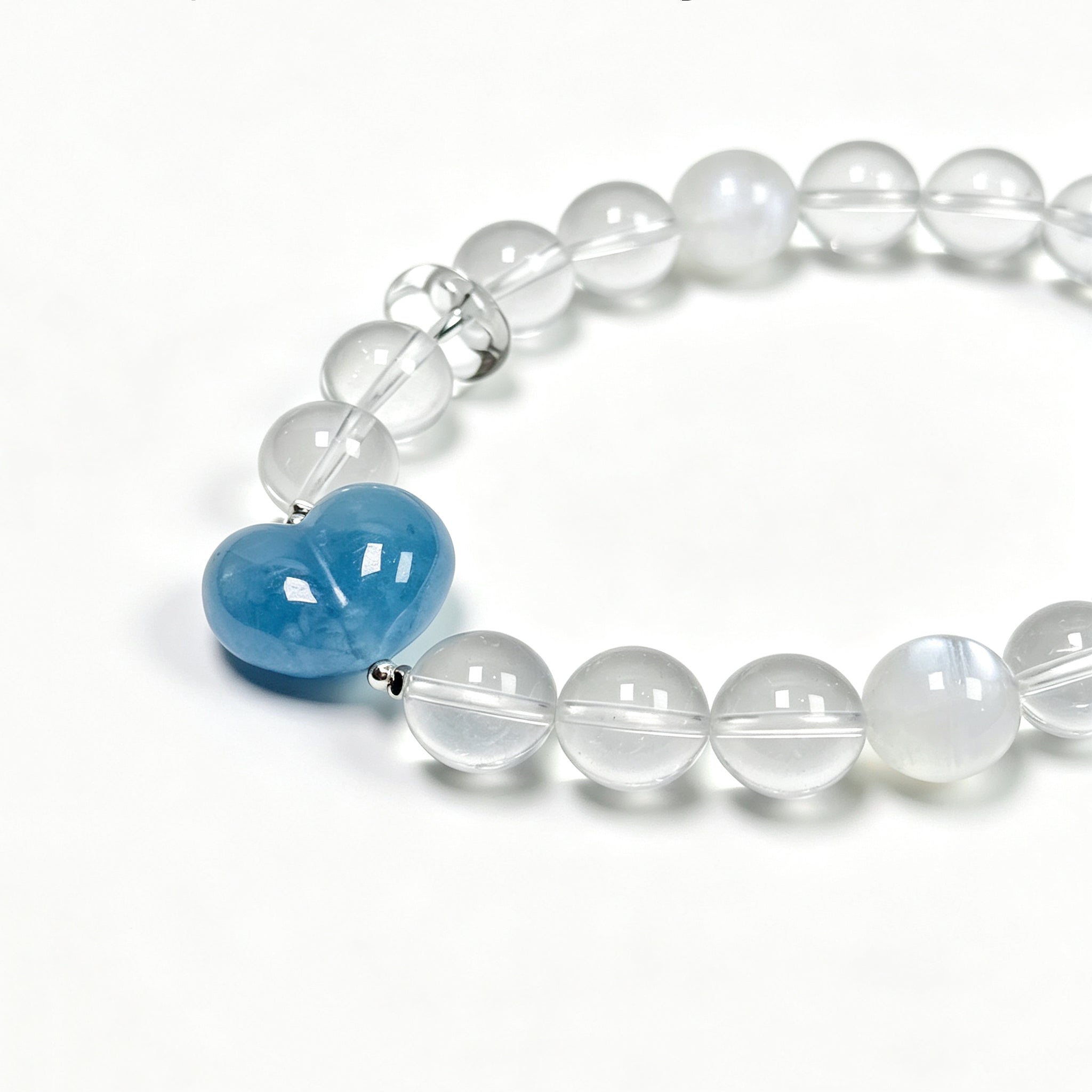 Close-up detail of Snow Strawberry Quartz bracelet showing natural texture and soft shimmer