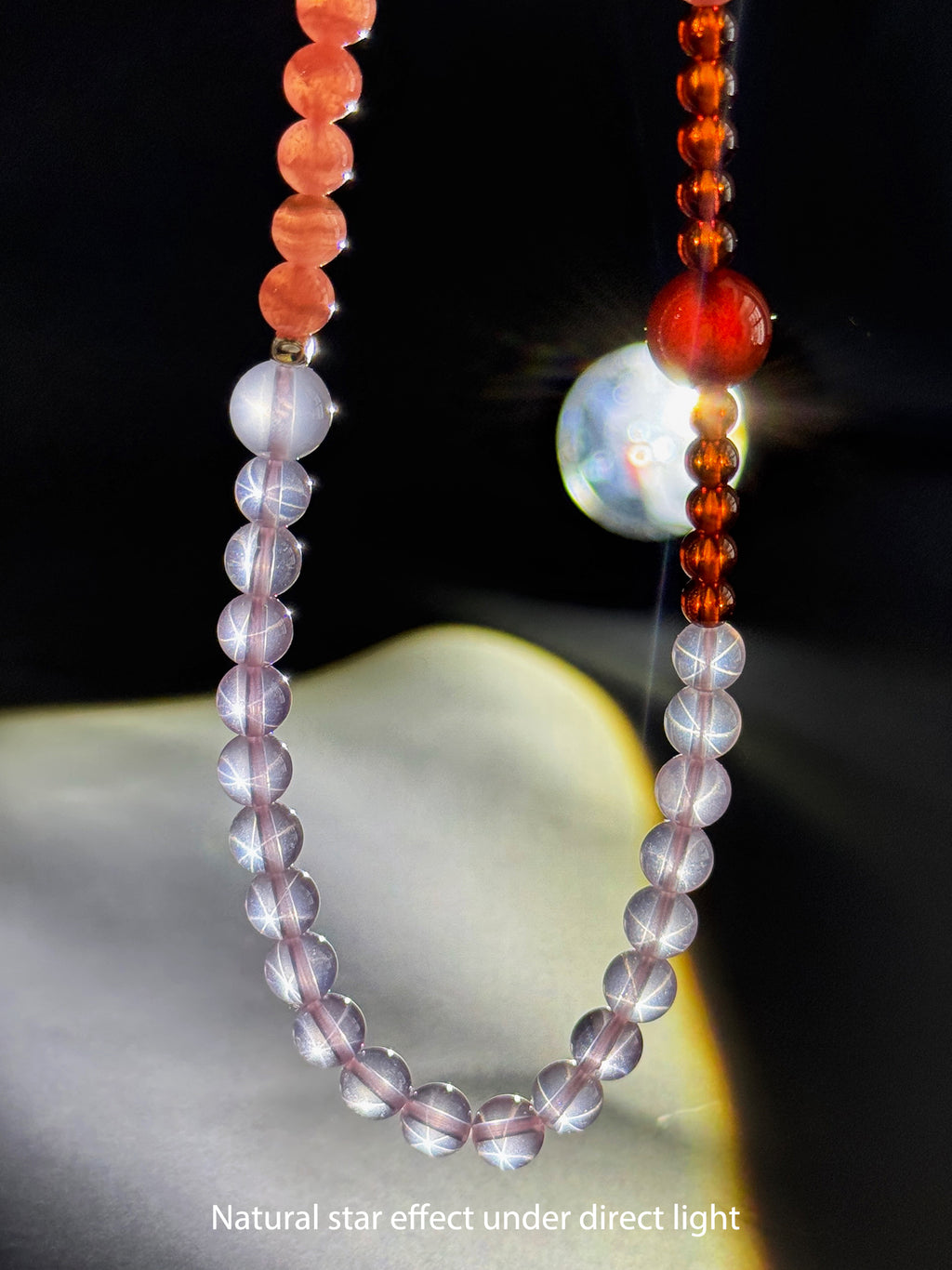 Close-up detail of natural Star Rose Quartz showing soft luminous glow and internal texture