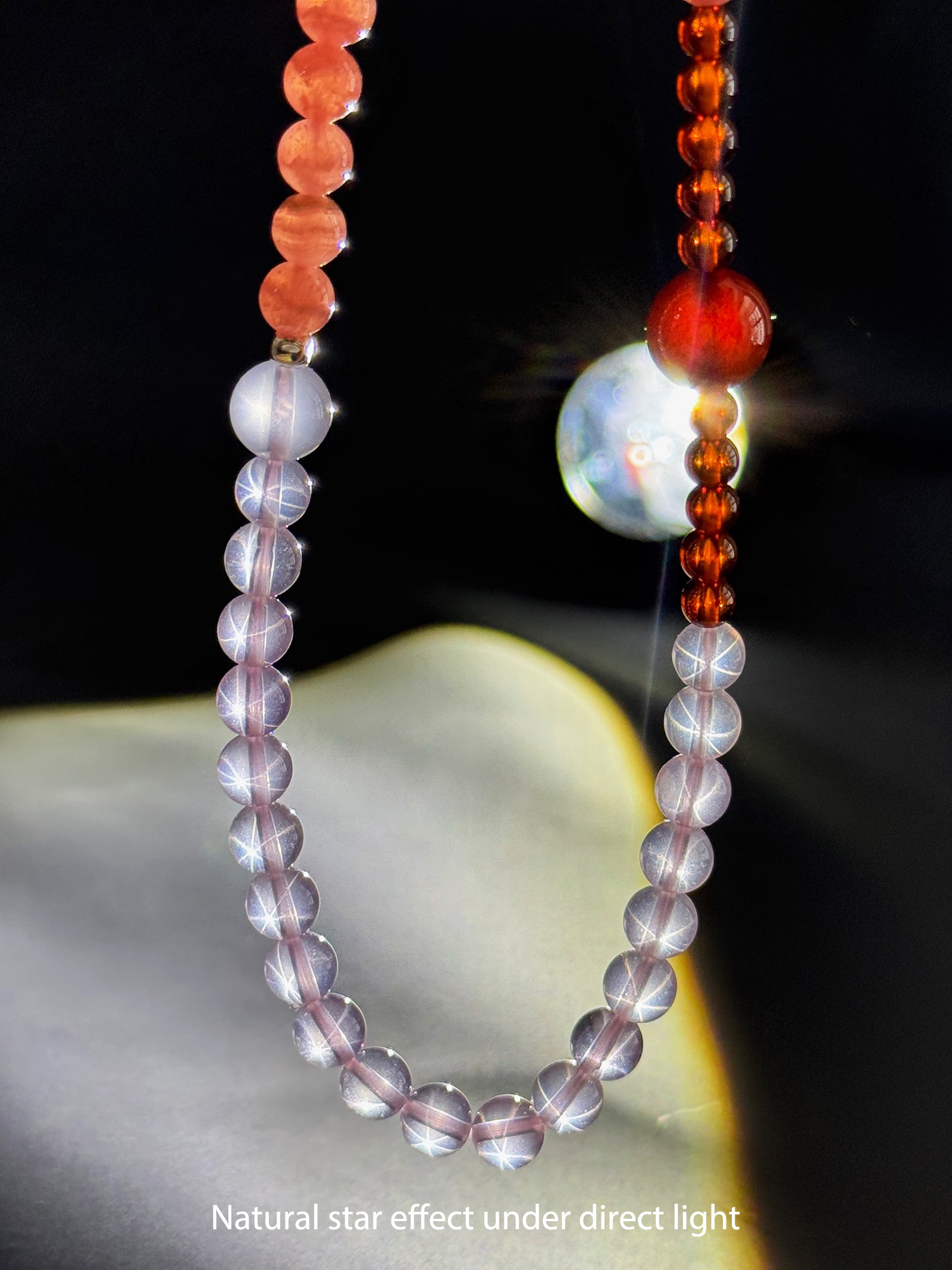 Close-up detail of natural Star Rose Quartz showing soft luminous glow and internal texture