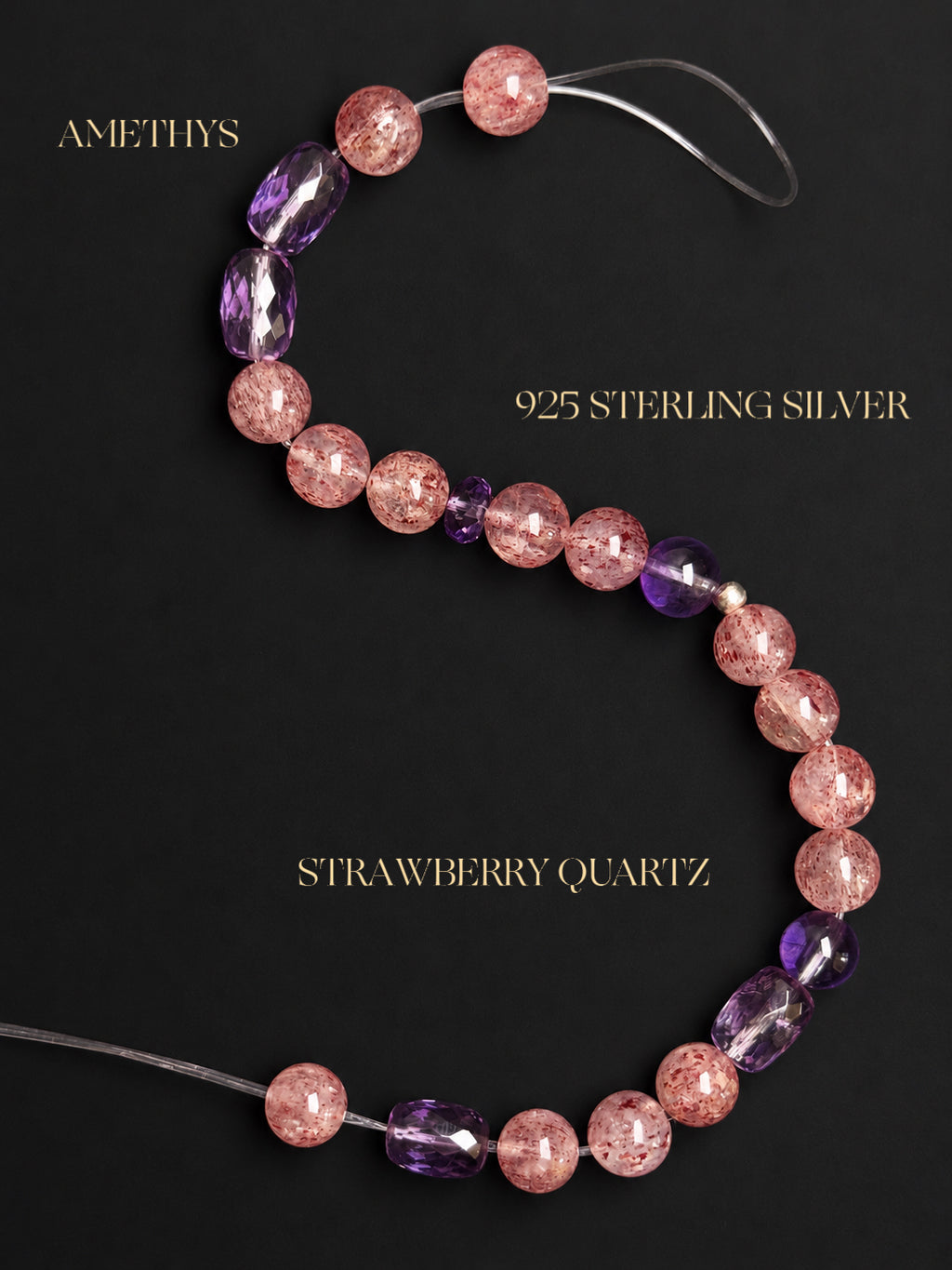 Natural Strawberry Quartz and Amethyst bracelet displayed on a black mineral-inspired background, highlighting the pink and purple gemstones, natural inclusions, and crystal textures.