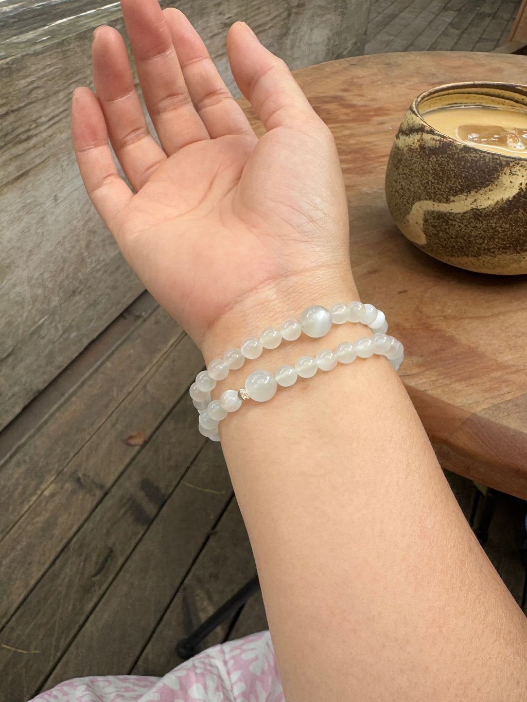 Back view of White Moonstone double wrap bracelet worn on wrist showing fit and clasp detail